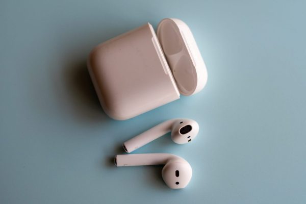 What do the lights on the AirPods' charging case mean?